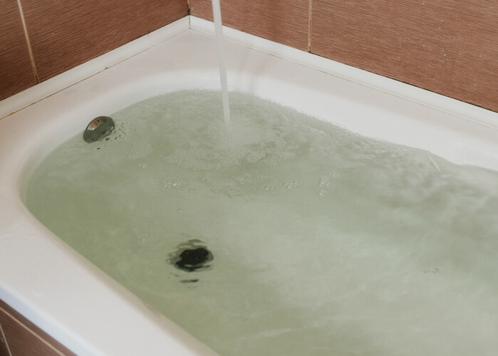 Bathroom flood restoration by Team Delta